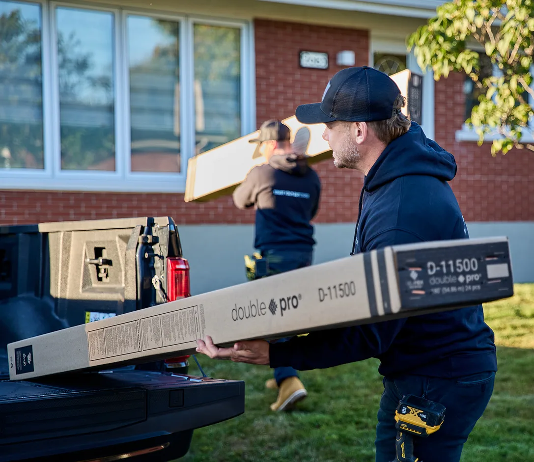 Owner Arick Yasinski on site with gutter protection materials